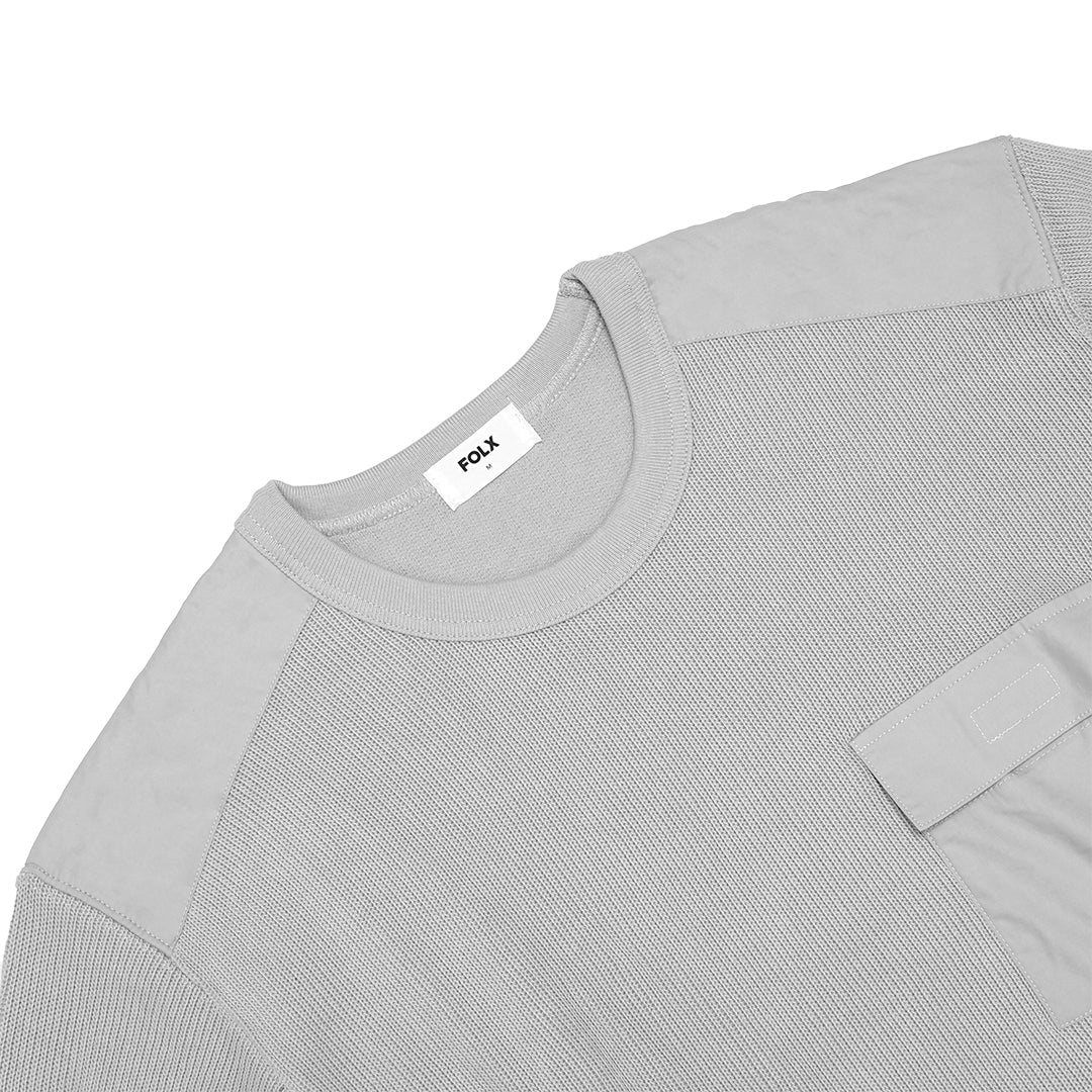 FOLX Woven Chest Pocket Sweater